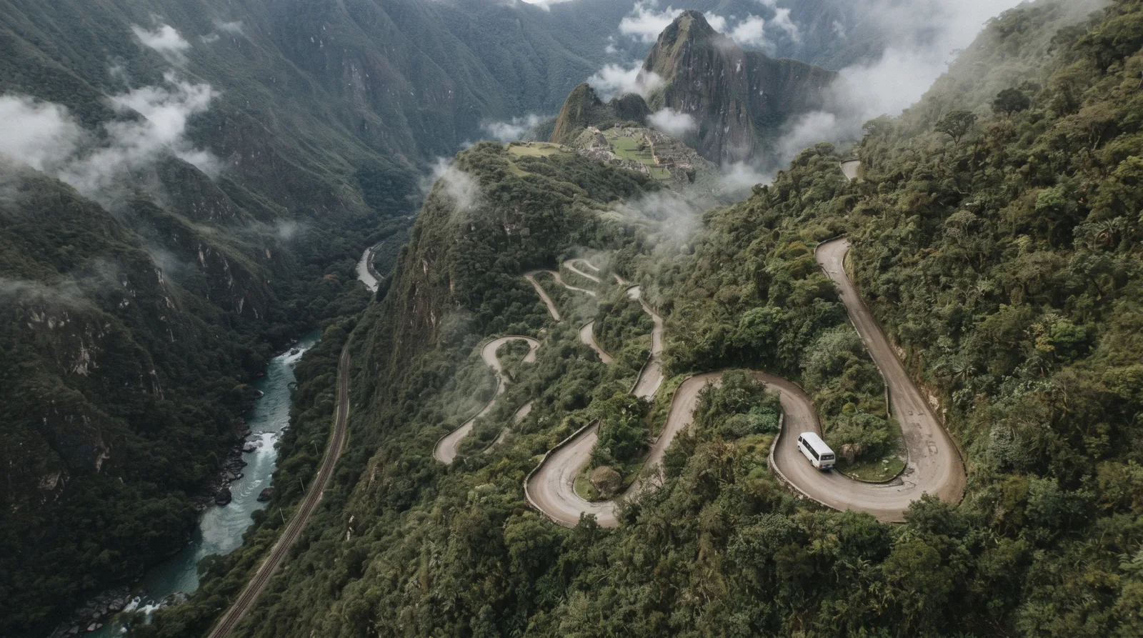 The path and road from Aguas Calientes climbing toward the Machu Picchu entrance gate, Peru