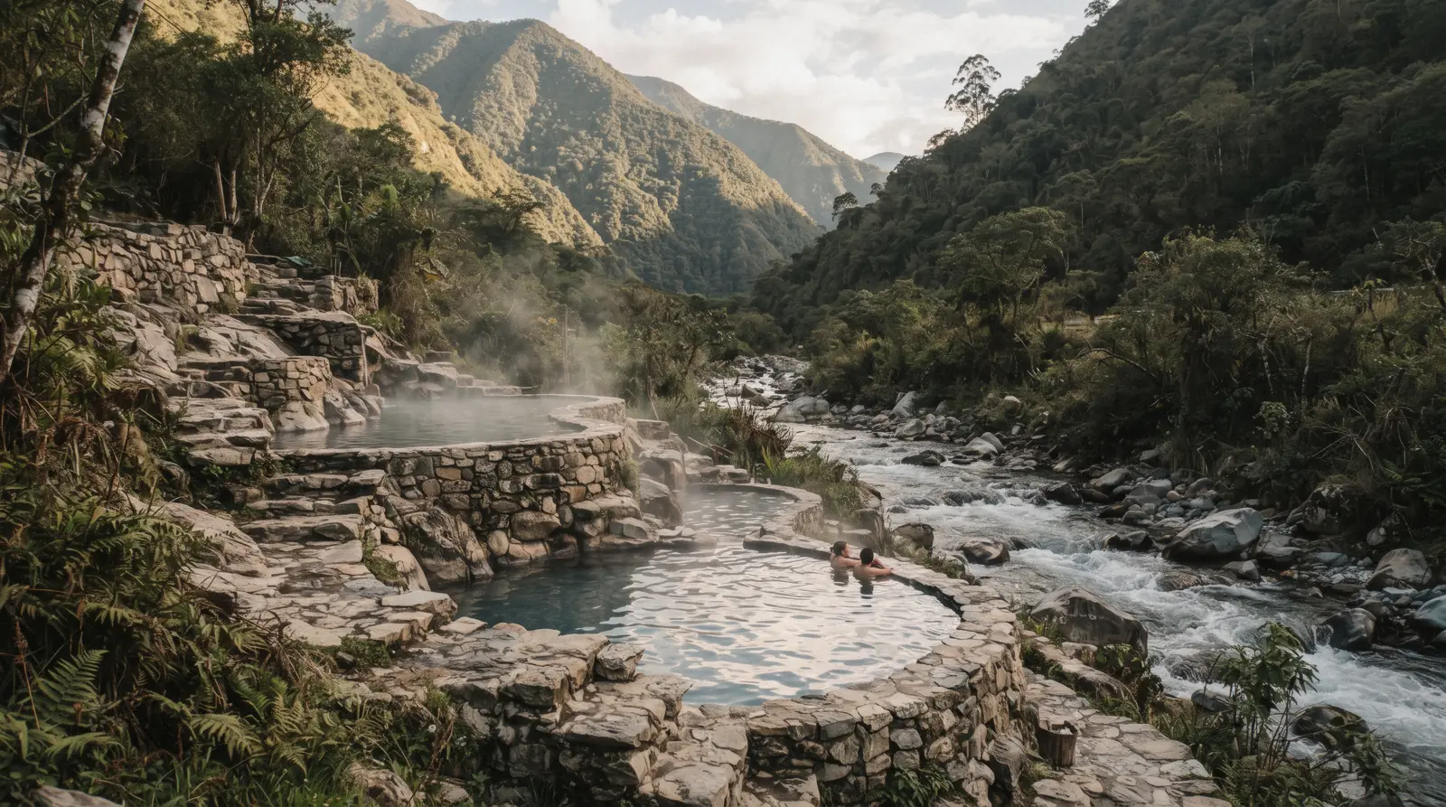 Stone-lined thermal pools beside the Vilcanota river at the Cocalmayo hot springs near Santa Teresa, Peru