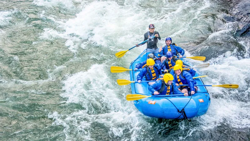 Rafters on a jungle river during the 4-day Inca Jungle Adventure to Machu Picchu, Peru