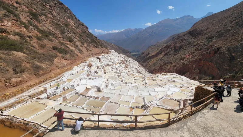 Terraced salt pools at Maras visited on a Sacred Valley day trip near Ollantaytambo, Peru